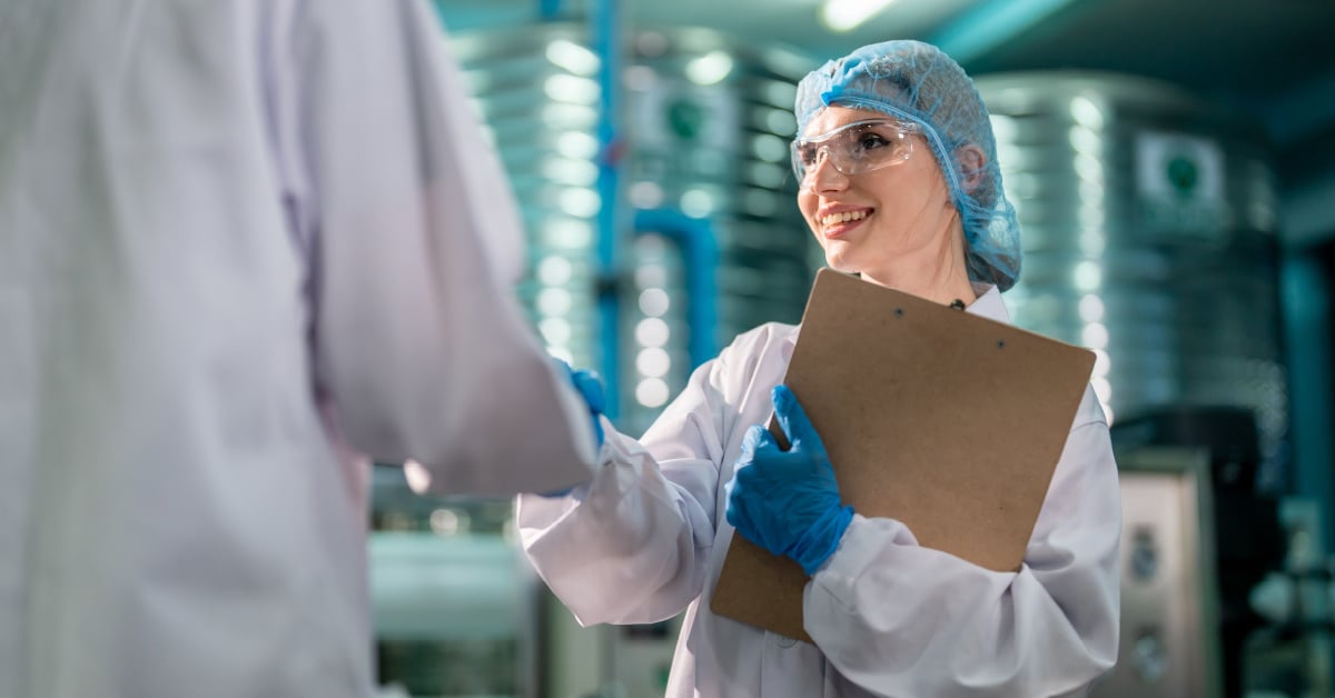 Scientist shaking hands